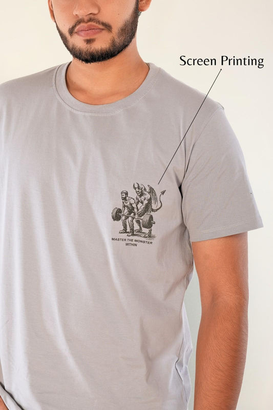 Screen printed graphic detail on stone grey t-shirt | Premium heavy gauge cotton tee with 'Master The Monster Within' artwork - showcasing quality print technique and regular fit design for men's casual fashion