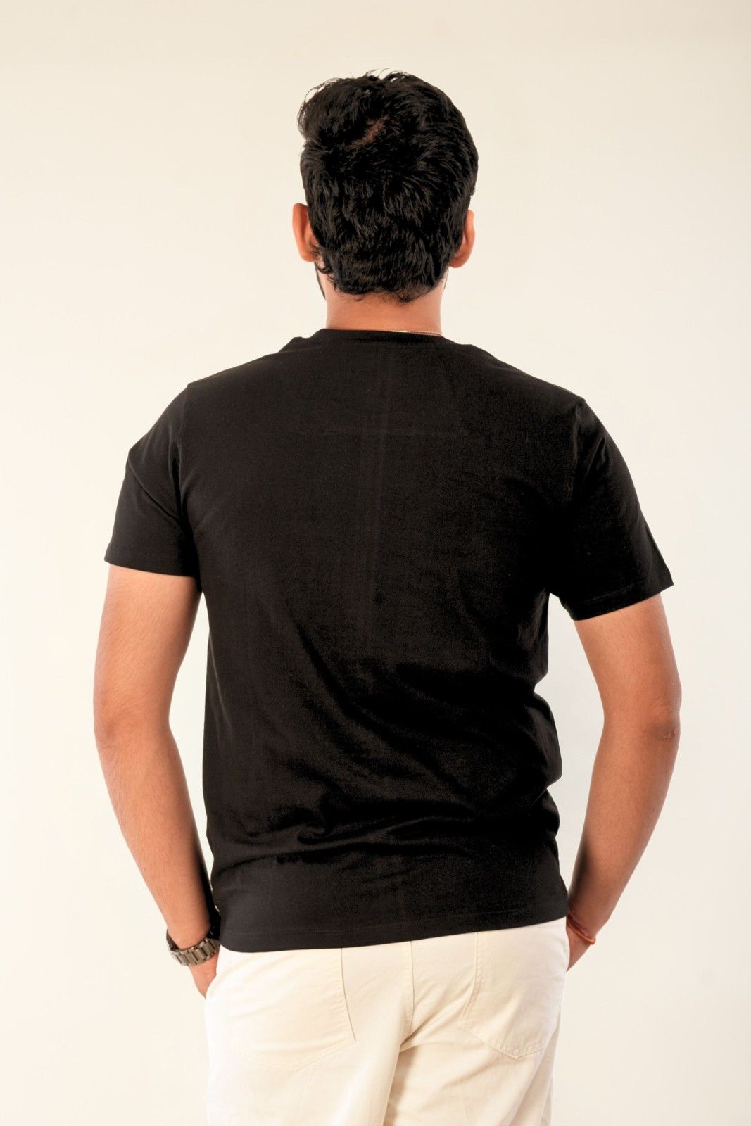 Men's black graphic t-shirt back view | Premium cotton streetwear with gentle fabric and raised ink print | Regular fit urban fashion India
