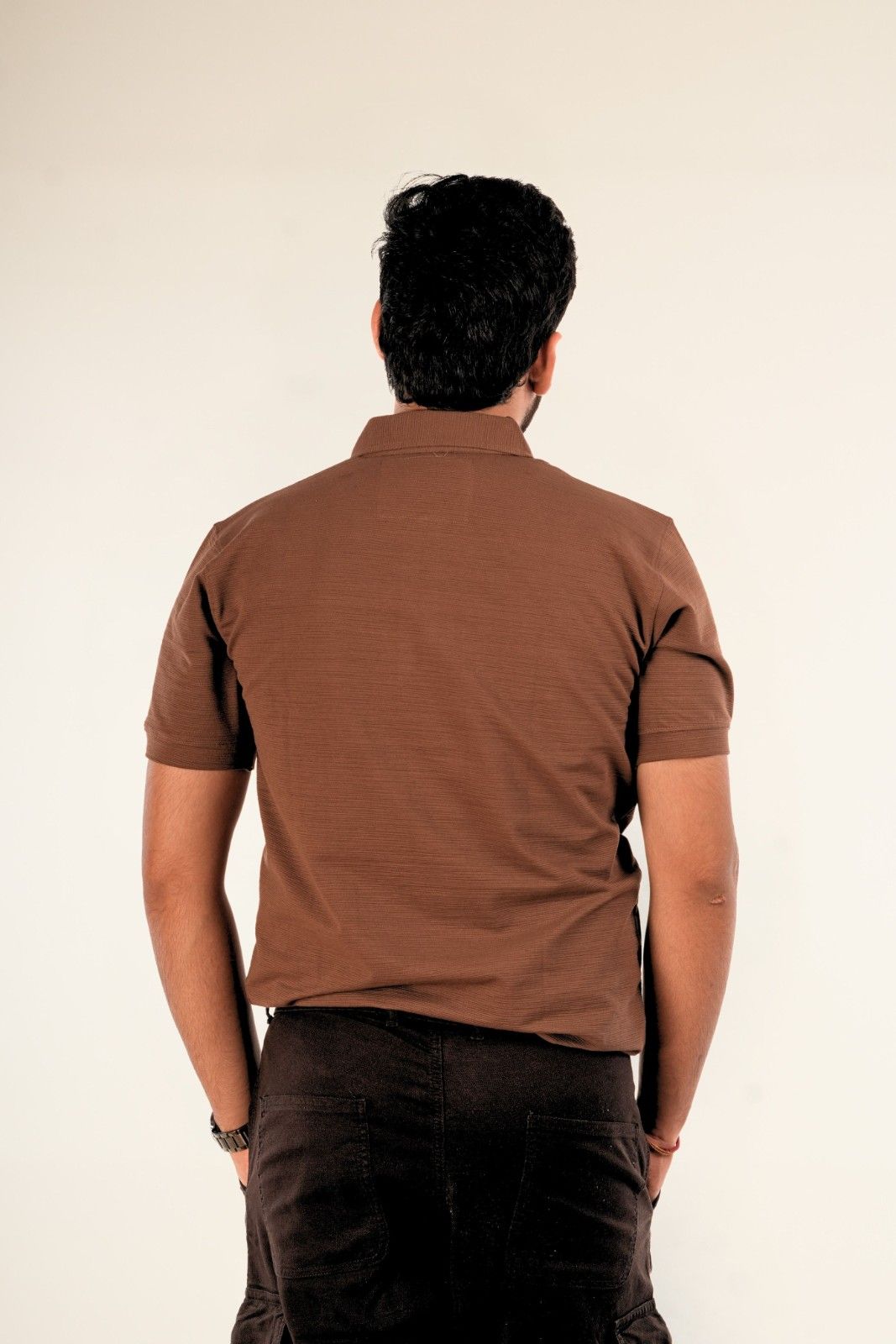 Back view of brown textured polo shirt for men showing pique fabric weave and regular fit - Berrys & Cigaredes