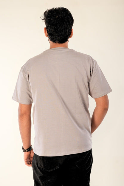Back view of premium oversized grey t-shirt by Berrys & Cigaredes, constructed from heavyweight French cotton with clean minimal design and superior fabric quality.