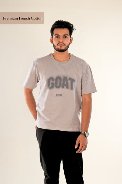Men's oversized streetwear t-shirt in soft grey with premium French cotton fabric. Features GOAT distressed graphic print and minimalist design by Berrys & Cigaredes.