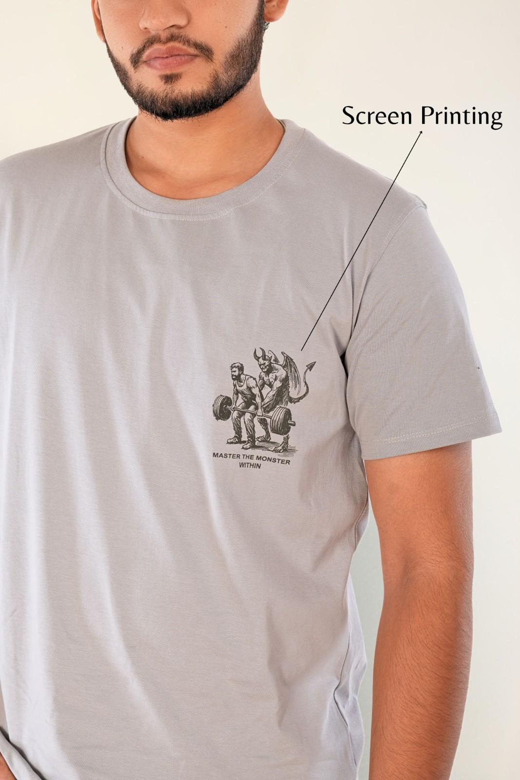 Screen printed graphic detail on stone grey t-shirt | Premium heavy gauge cotton tee with 'Master The Monster Within' artwork - showcasing quality print technique and regular fit design for men's casual fashion