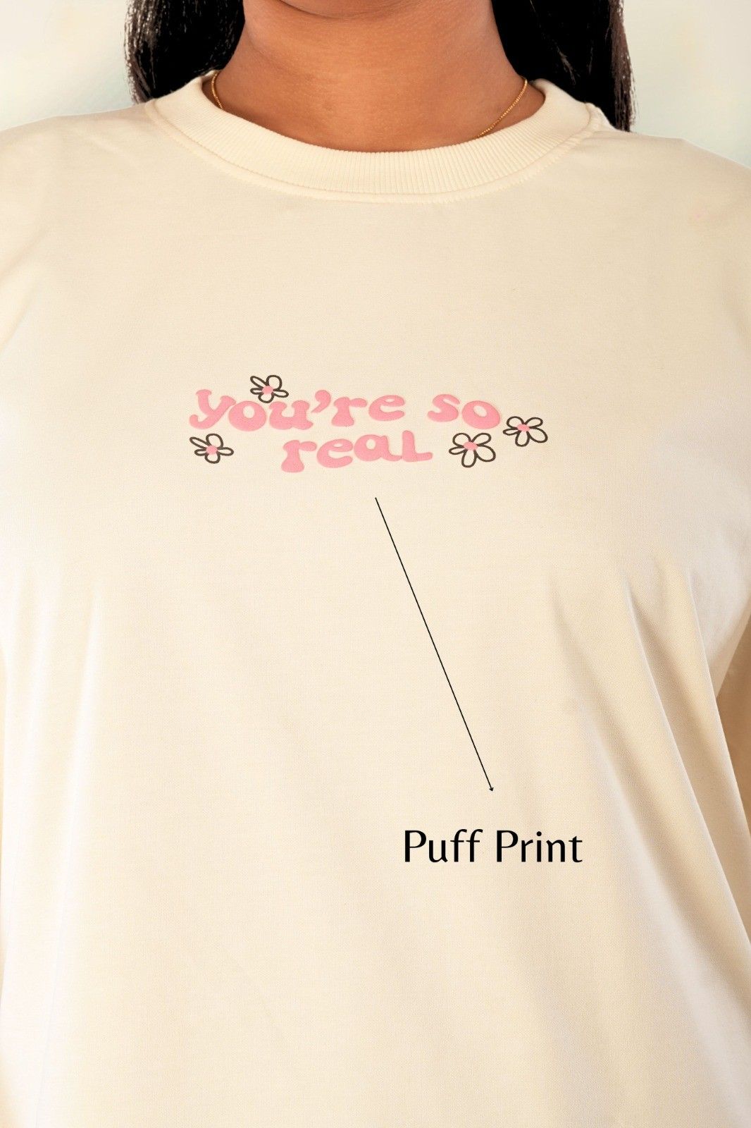 Puff print 'You're So Real' oversized t-shirt in cream with raised texture graphic design, premium women's casual tee
